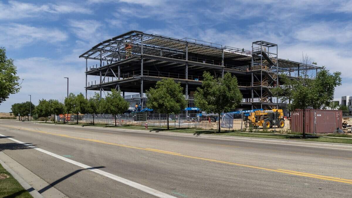 Construction is underway on a 4-story, 100-000-square foot office building dubbed the "Sentinel," at Brighton's Ten Mile Crossing development along I-84.