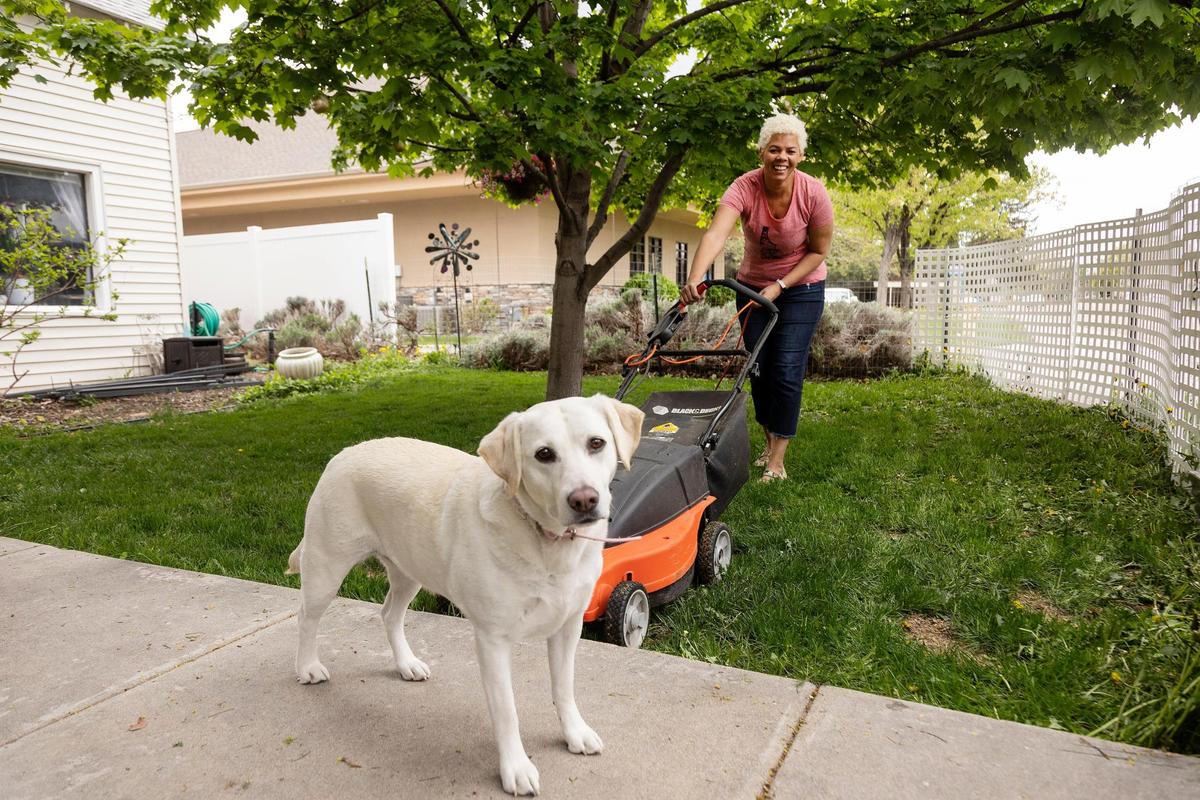 Leta Harris Neustaedter’s dog Annabelle begs for attention as she mows the front yard of her new home in Nampa. When searching for her new house, Harris Neustaedter initially wrote “love letters” to let sellers get to know her on a personal level, but she later decided that divulging personal information could lead to discrimination.