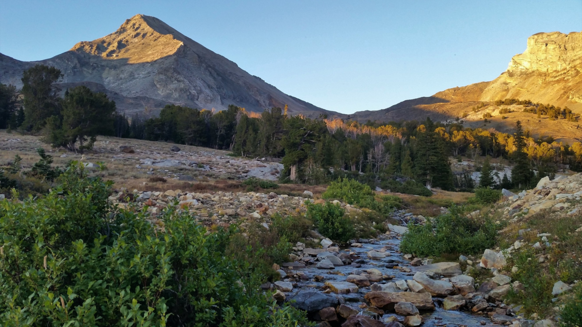 Camping in the Hyndman Basin before your climb offers the added advantage of enjoying a Pioneer Range sunset. Hyndman Peak is at left.