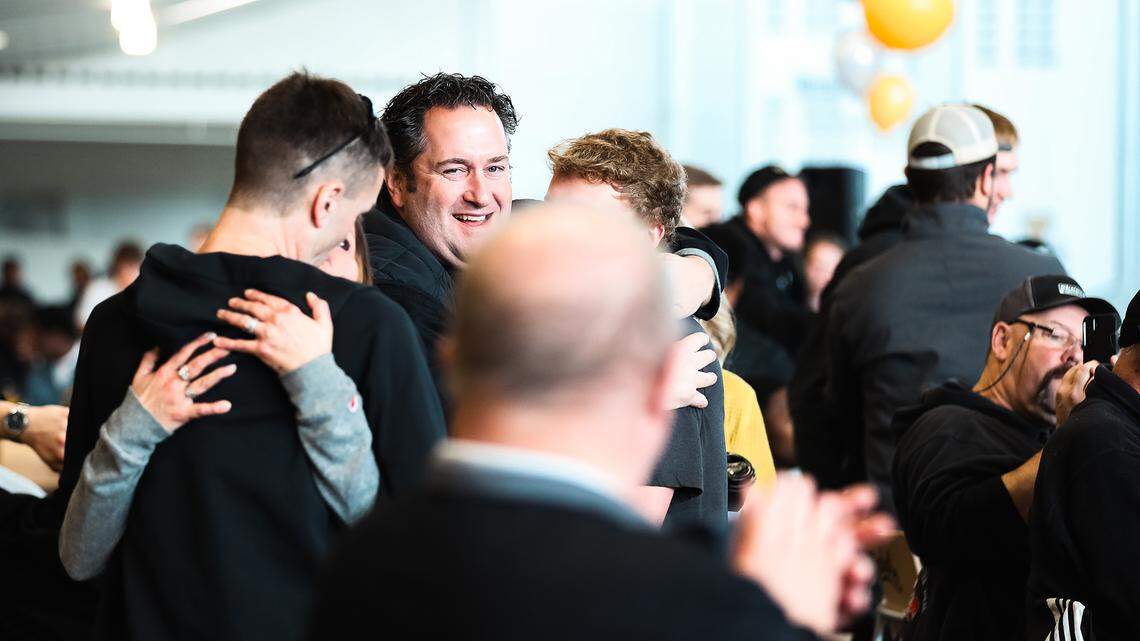 University of Idaho football coach Jason Eck celebrates with his team after learning the Vandals earned an at-large bid in the FCS playoffs.
