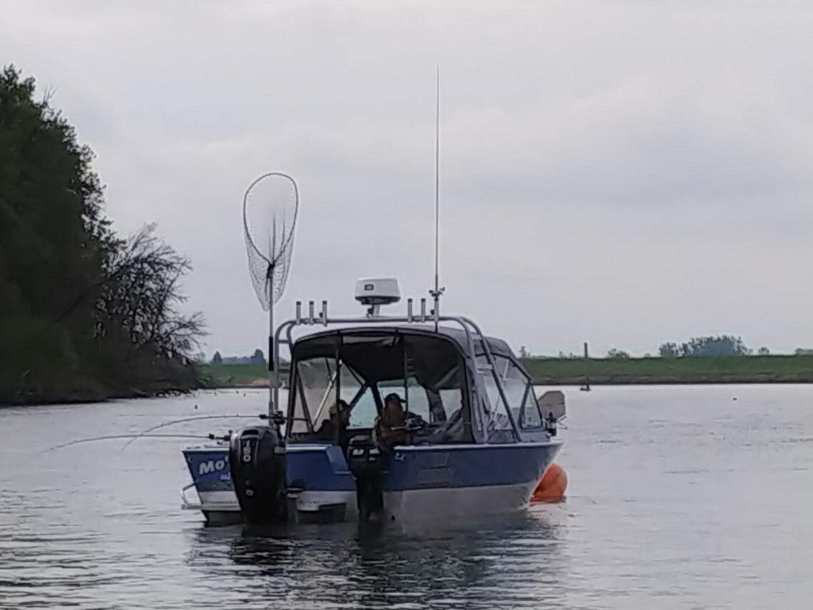 Anglers in a fully equipped salmon rig fish for spring Chinook salmon on the Willamette River in April.