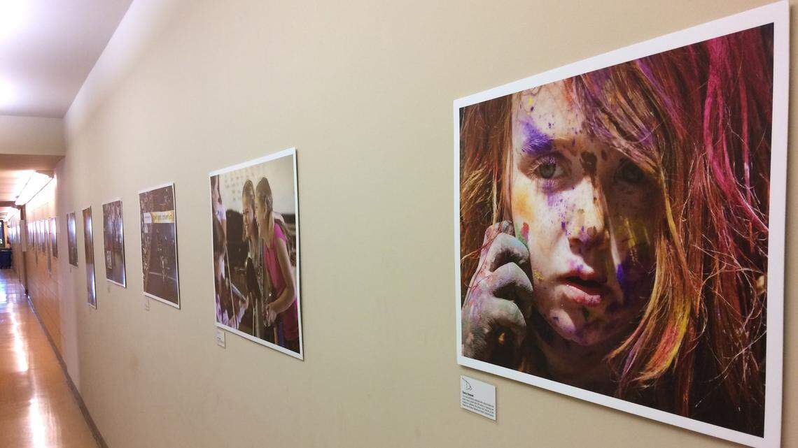 Pictures by the paper’s staff photographers line portions of the main hallways inside the Idaho Statesman building at 1200 N. Curtis Road. Photo by David Staats