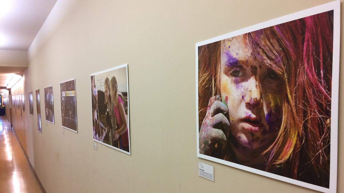 Pictures by the paper’s staff photographers line portions of the main hallways inside the Idaho Statesman building at 1200 N. Curtis Road. Photo by David Staats