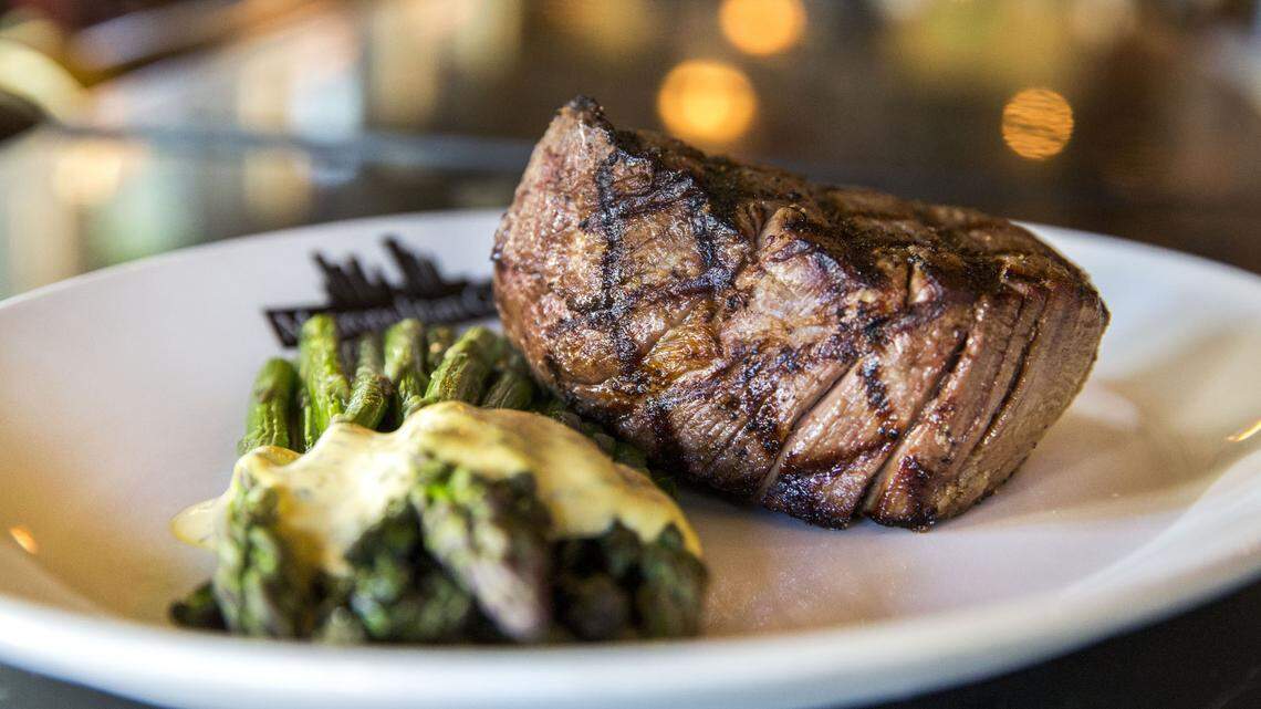The Met’s filet mignon is priced at $60 for an 8-ounce portion. Asparagus with Béarnaise sauce, pictured, is not on the opening menu at Crave Delivery.