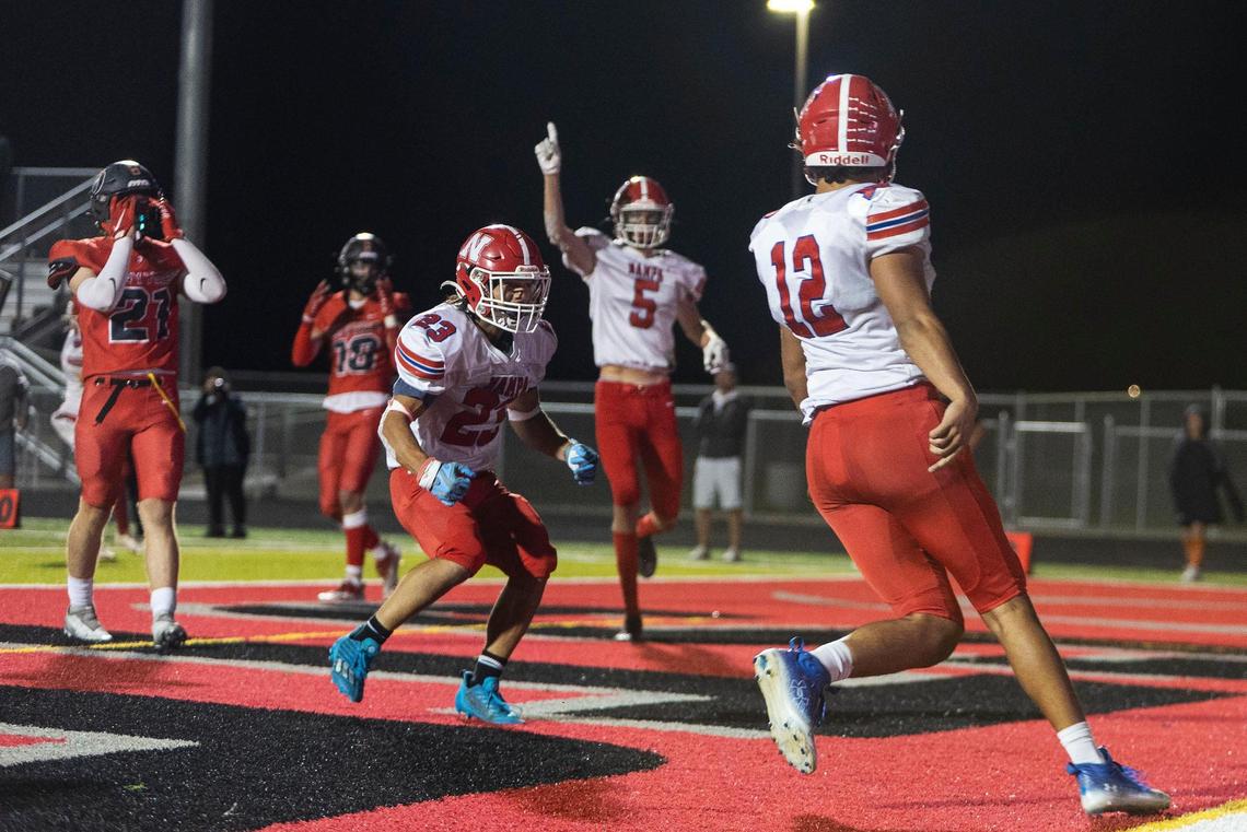 Nampa tight end Payton Gunter (12) catches the game-winning touchdown with 33 seconds left in a 26-24 win at Owyhee.