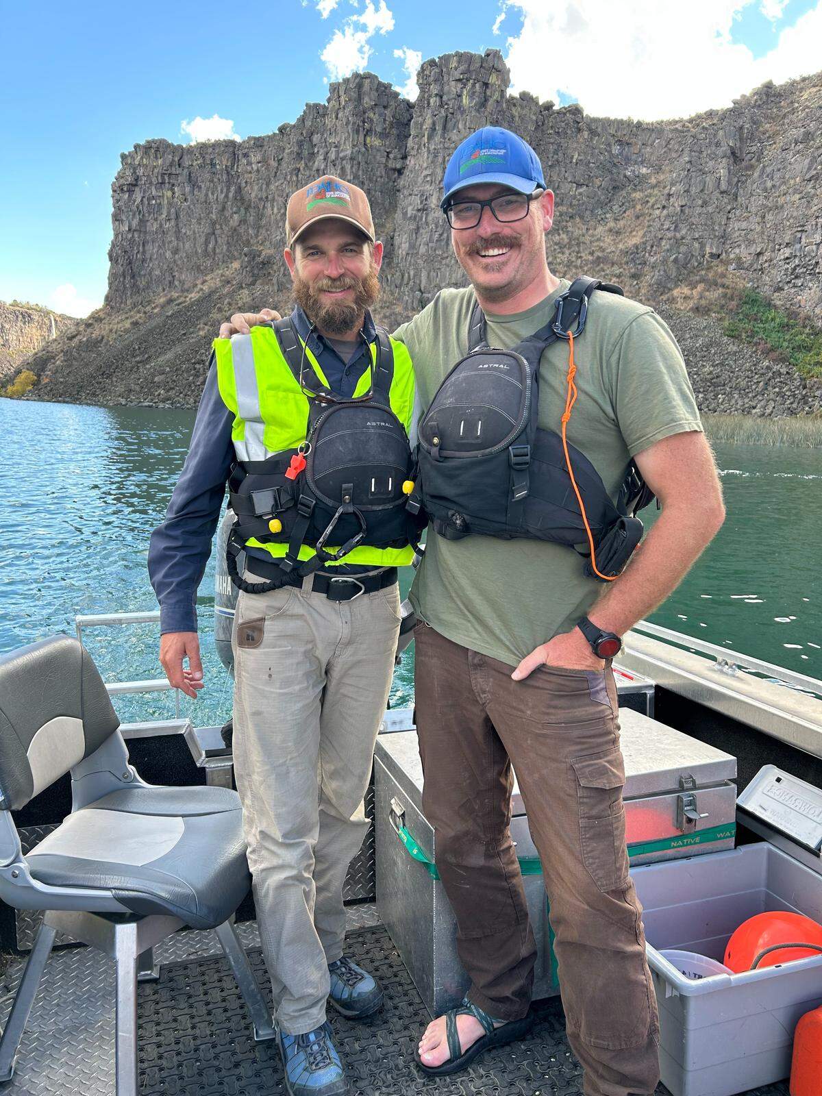 After weeks of treating the Snake River to eradicate invasive quagga mussels, project leaders Nic Zurfluh, left, bureau chief of invasive species, noxious weeds and range programs for the Idaho Department of Agriculture, and Jeremey Varley, the department’s chief treatment engineer, are “attached at the hip,” Varley said.