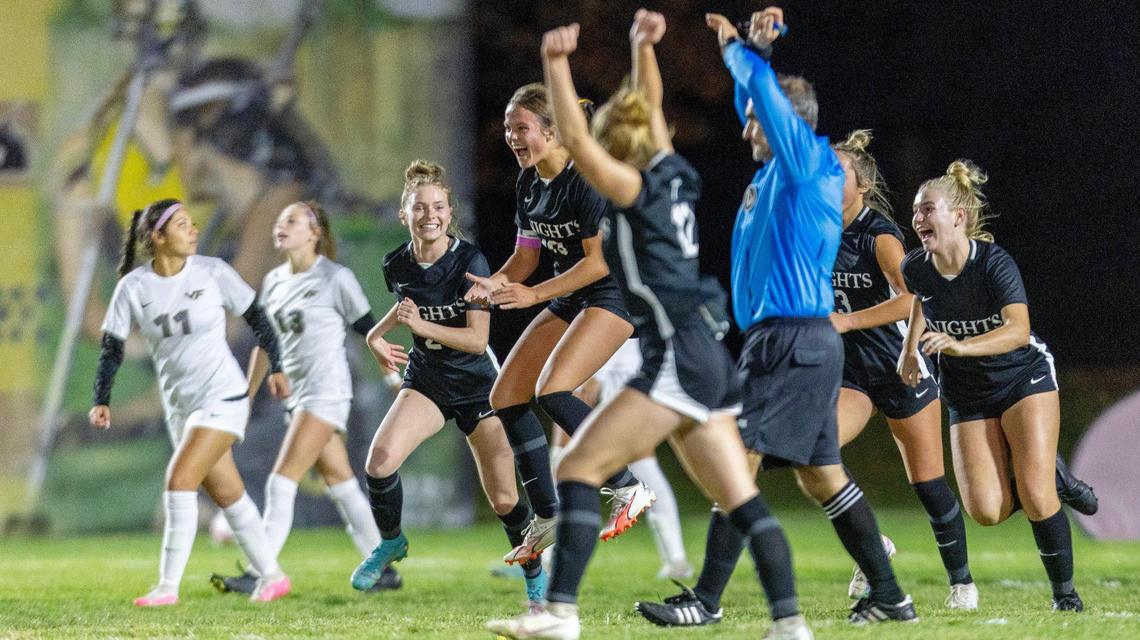 Bishop Kelly junior Taylor Deitzel jumps in the air after scoring the Knights’ final goal in a 5-2 win over Vallivue on Thursday. The victory clinched Bishop Kelly its 15th straight 4A District Three Tournament title.