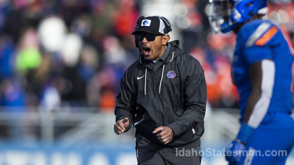Boise State head football coach Andy Avalos celebrates as the Broncos score a touchdown in the second quarter against Utah State in November 2022.