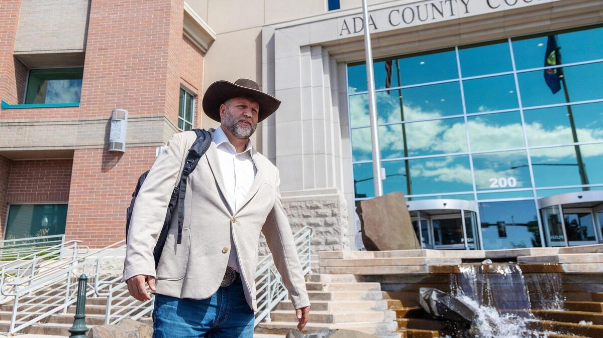 Ammon Bundy walks out of the Ada County Courthouse in Boise after his arraignment hearing with Judge Nancy Baskin, Tuesday, Aug. 29, 2023.