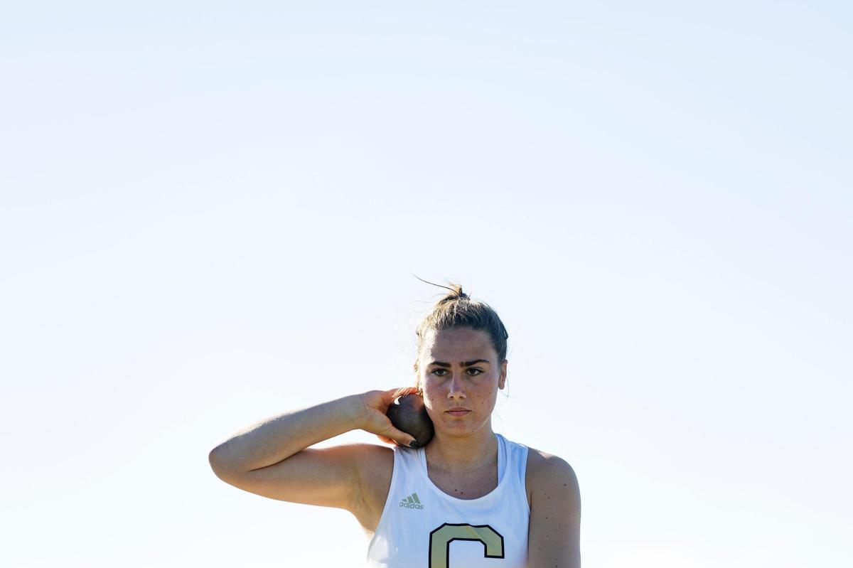 Capital’s Grace Strickland competes in the shot put during the 5A District Three track and field championships held at Kuna High School on Friday.