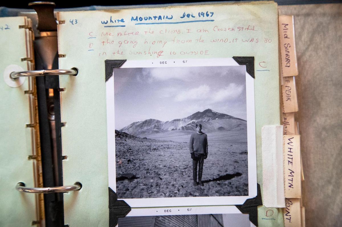 Jon Fredland has kept a chronicle of his mountaineering adventures. Some trips have photos like this Polaroid of him after climbing White Mountain Peak, Calif., in 1967 with the note, “Me after the climb. I am frozen stiff.”