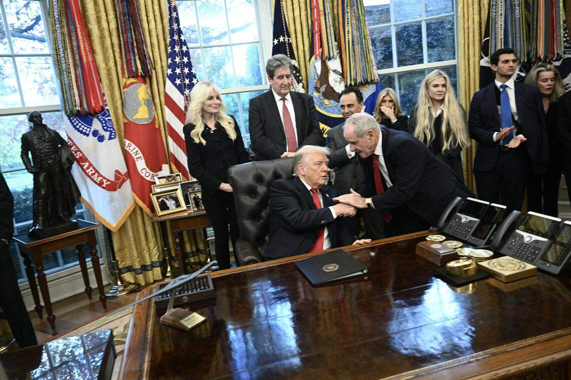 US President Donald Trump shakes hands with US Senator James Risch, Republican from Idaho during a swearing-in ceremony for the newly appointed Ambassador to India Sergio Gor in the Oval Office of the White on November 10, 2025 in Washington, DC. (Photo by Brendan SMIALOWSKI / AFP) (Photo by BRENDAN SMIALOWSKI/AFP via Getty Images)