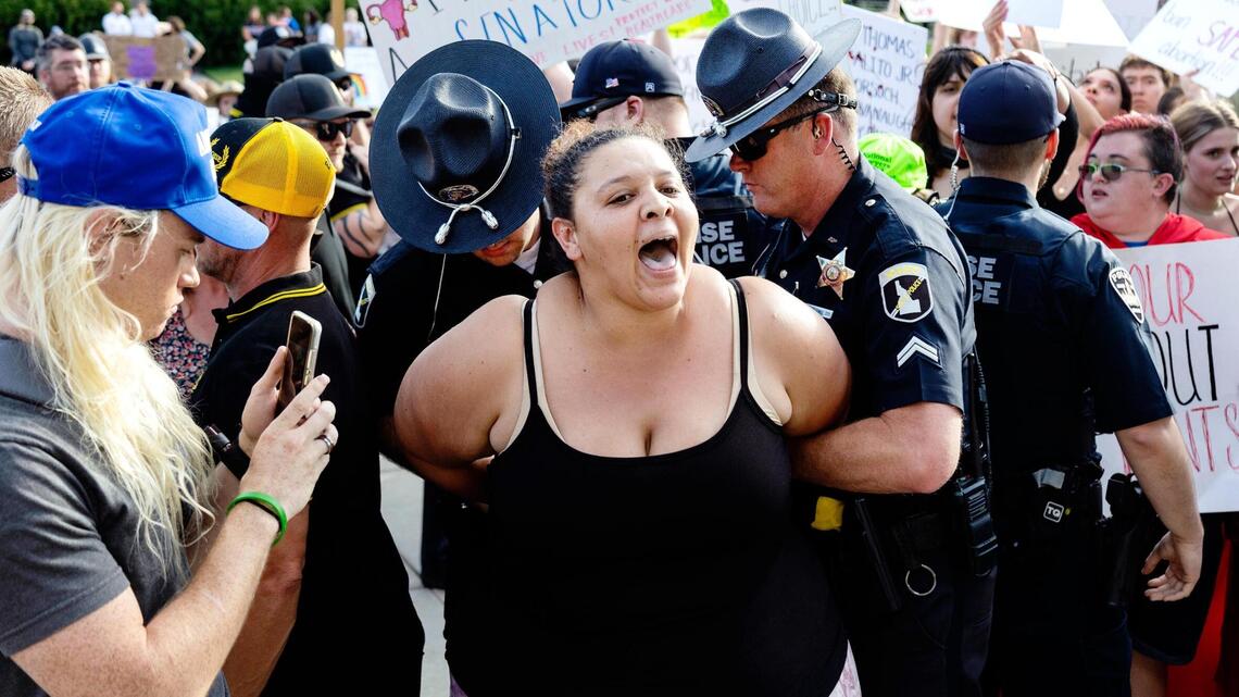 Judge: Abortion protester’s lawsuit against Idaho State Police troopers can go to trial