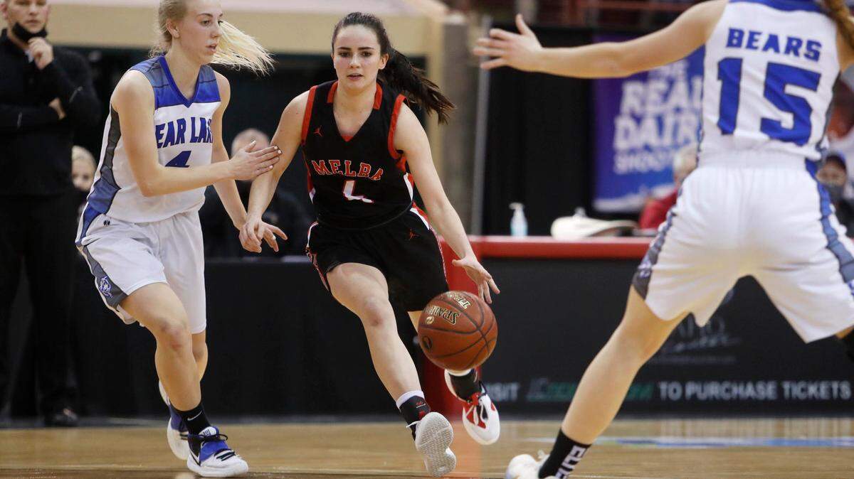 Melba’s Kate Clark, center, was voted the 2A All-Idaho Player of the Year by the state’s coaches.