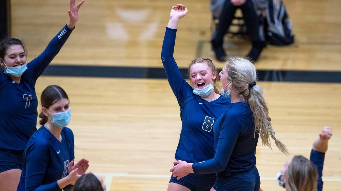 Skyview sisters Alex Bower (8) and Eden Bower celebrate a point with their teammates during the 5A District Three volleyball championship. Both were selected to the 5A all-state first team.