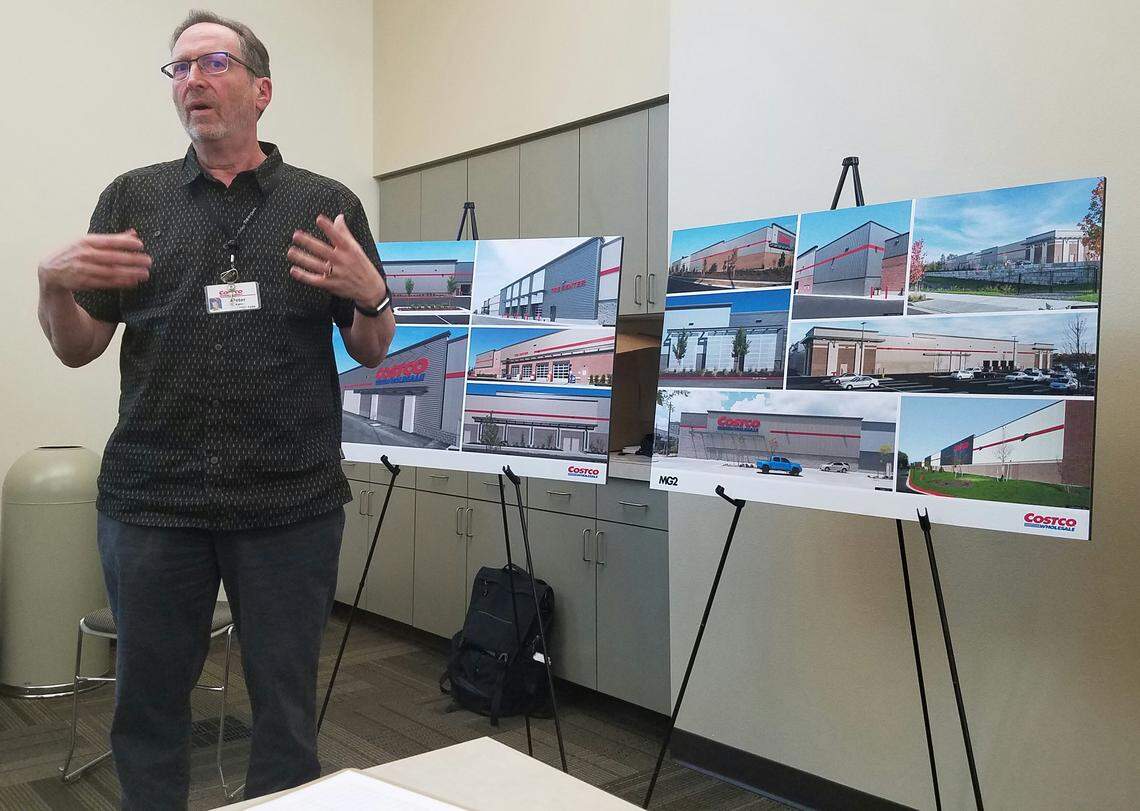 Peter Kahn, assistant vice president of real estate development for Costco Wholesale, tells neighbors that the company wants their input in choosing an exterior design.