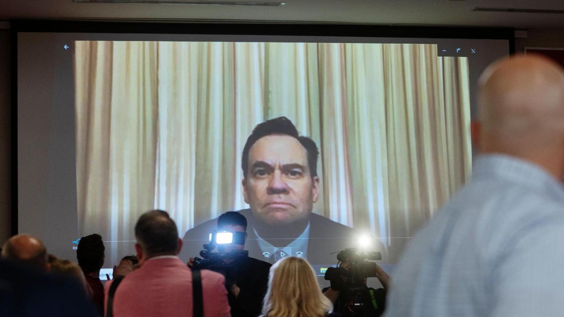 Rep. Russ Fulcher speaks on live video to guests at an election watch party held at the Hilton Garden Inn Boise Downtown on Tuesday, May 17, 2022.