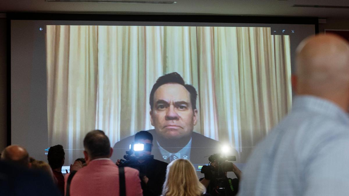Rep. Russ Fulcher speaks on live video to guests at an election watch party held at the Hilton Garden Inn Boise Downtown on Tuesday, May 17, 2022.