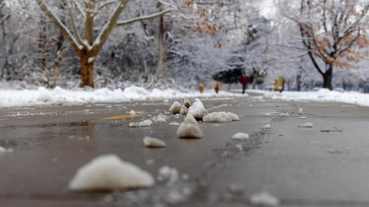 Some clumps of snow remain on the Greenbelt after a fresh plow of the area at Ann Morrison Park in Boise on Friday.