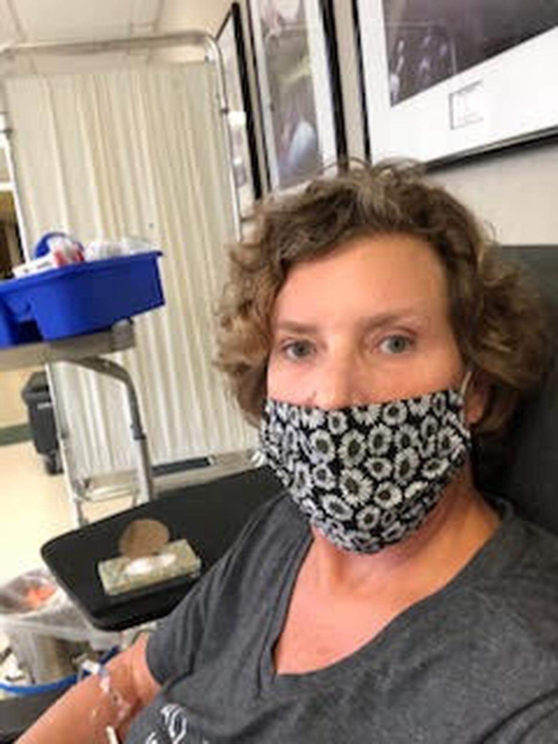 Shelly Thiel sits in an emergency room in Idaho Falls while sick with COVID-19 in November. She survived, but Thiel now has “long hauler” symptoms such as tachycardia.