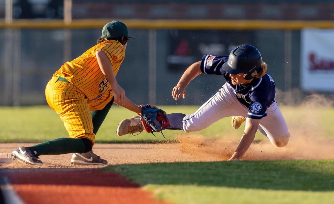 Bonneville’s Coltan Spagnuolo tags Skyview’s John Tyson at third base during the Bees’ upset win Thursday at Vallivue High School.