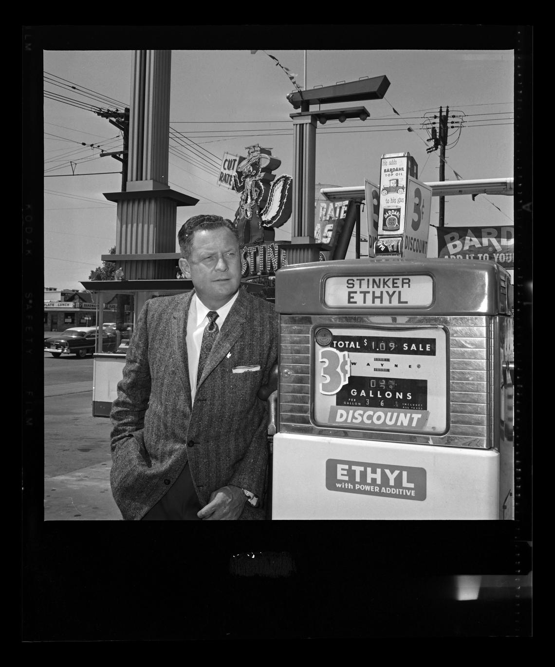 Farris Lind stands in front of a gas pump at a Stinker station in Salt Lake City in a 1959 photo from the Salt Lake Tribune. Ethyl was a premium gas containing the additive tetraethyl lead, which prevented knocking caused by an incorrect air-fuel mixture.