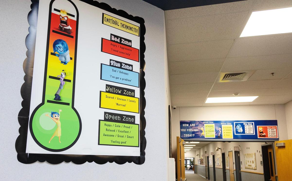Charts in the hallways of Franklin D. Roosevelt Elementary school in Nampa remind students of the different emotions they may experience at school. When students are feeling upset, they have the option to visit with one of the school’s two dogs to help regulate their emotions.