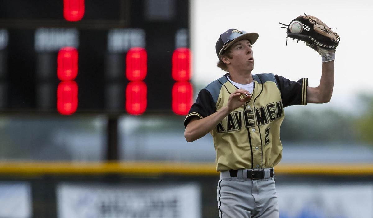 Kuna third baseman Kaeden Schutz stops a high bouncing grounder in last year’s 4A state baseball tournament.