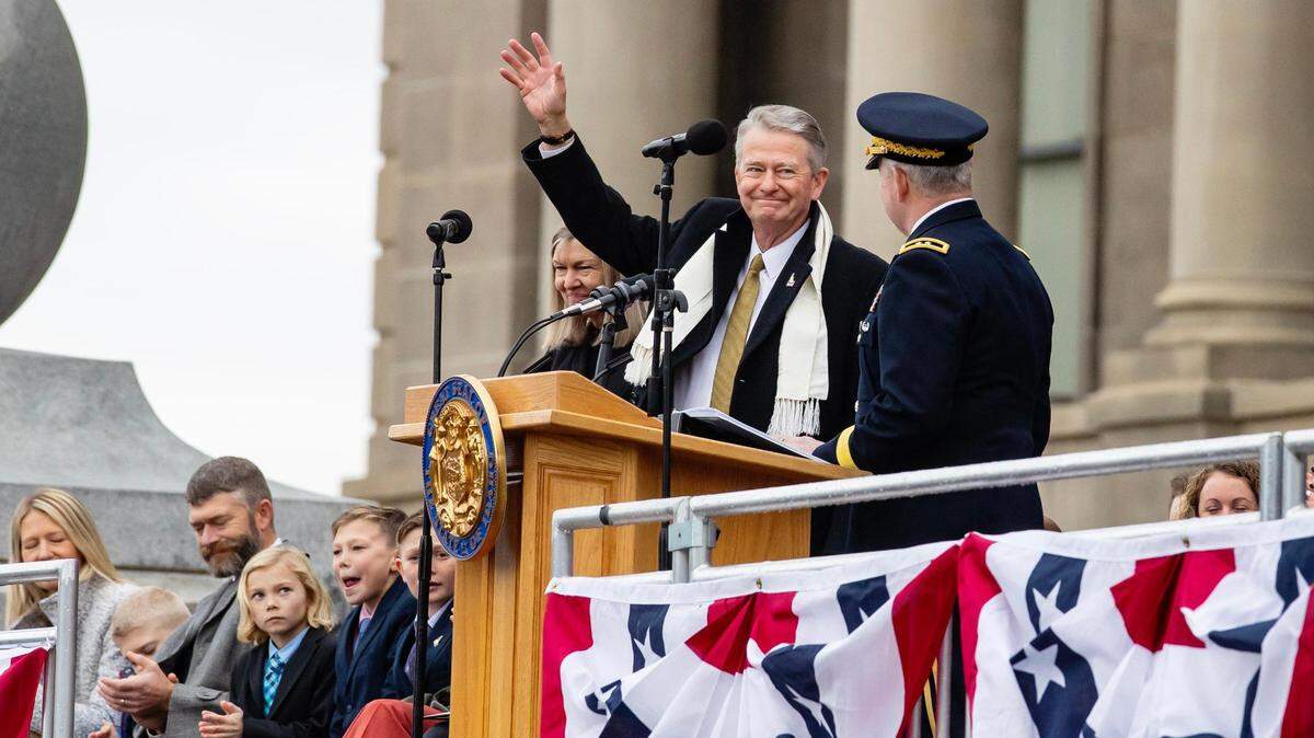 Governor Brad Little waves to the crowd at the Idaho Capitol during his inauguration for his second term as Idaho’s governor on Friday, Jan. 6, 2023.