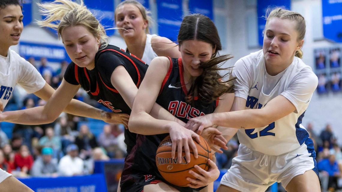Boise guard Alison Turke fights for possession with Timberline’s Emma Heninger on Tuesday. Boise held off a late rally for a 48-45 win to clinch the 5A SIC regular-season title.
