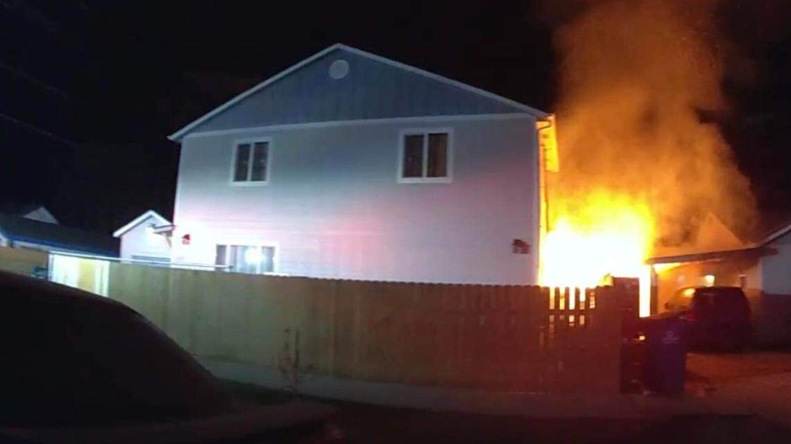 A Caldwell police officer rescued two people from a home in the 600 block of North Ninth Avenue after spotting the exterior ablaze while out on routine patrol late on Christmas Eve.