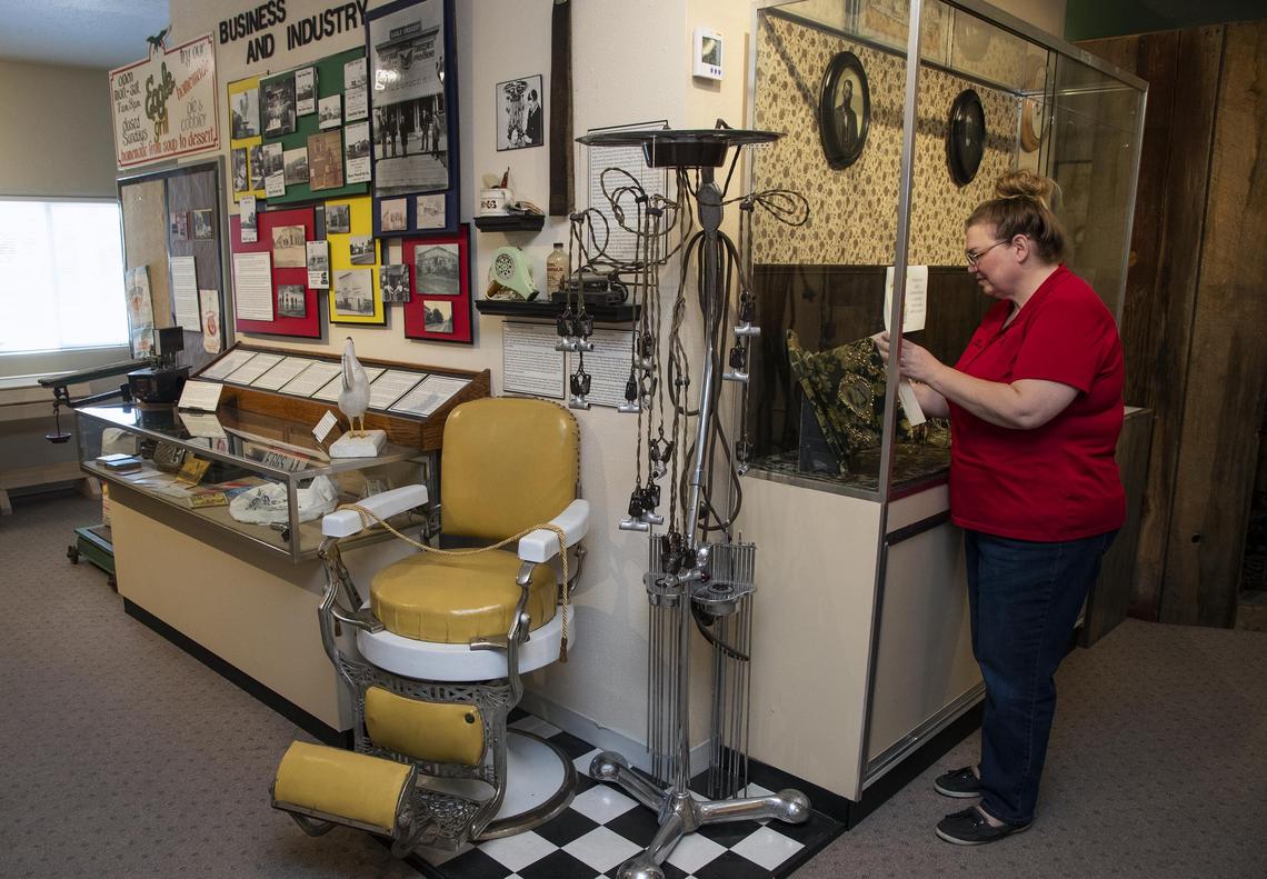 Eagle Historical Museum Curator Alana Dunn works on one of many exhibits at the museum’s current location on East State Street in downtown Eagle. The museum will relocate to the historic St. Matthew’s Catholic Church building at the end of North First Street.
