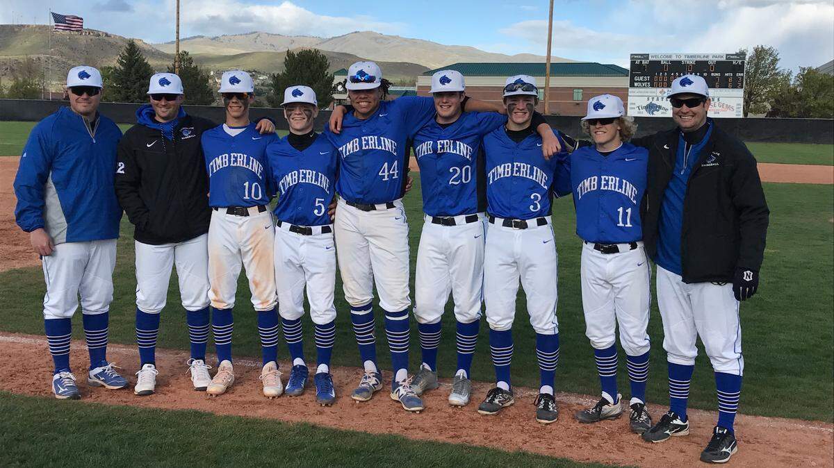 Timberline baseball coach Jeff Reifman, second from left, poses with Timbereline's seniors last season.