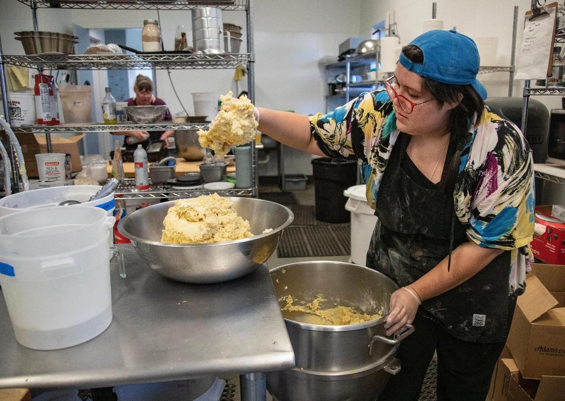 Gabrielle Gallegos makes dough for snickerdoodle cookies at Wildflour Bakery.