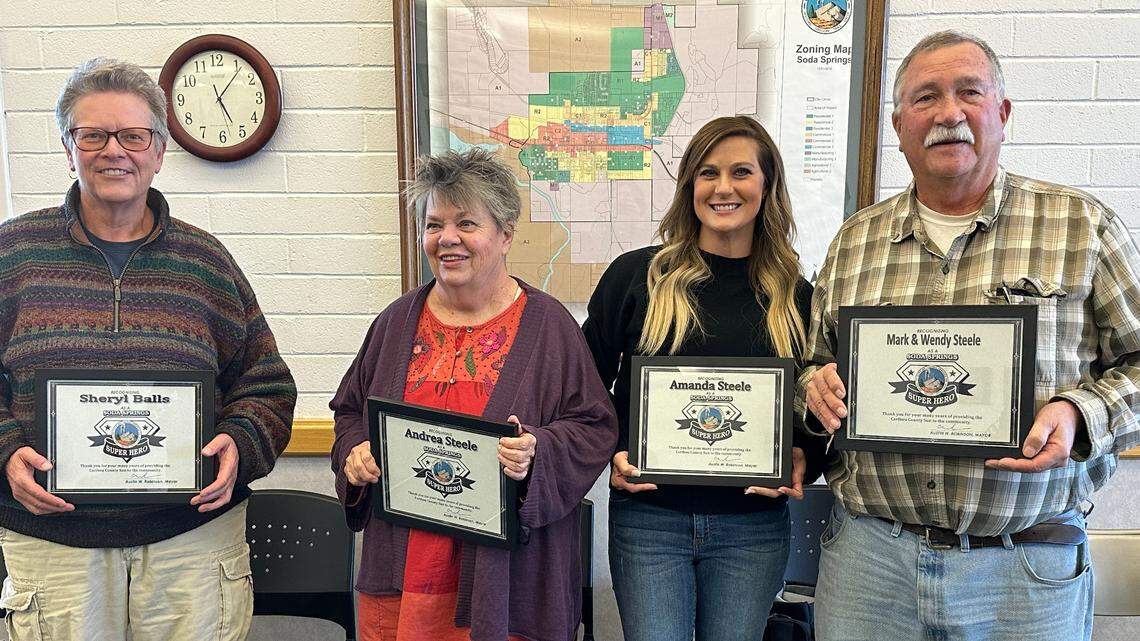 The Caribou County Sun and staff were named “Super Heroes” last month at a Soda Springs City Council meeting for their service to the community. From left are Sheryl Balls, who has worked at the Sun for 43 years; Wendy Steele, co-publisher; Amanda Steele, advertising and composition; and Mark Steele, publisher/editor. The paper, which was merged 93 years ago, ceased production Oct. 26 due to economic and changing factors in the newspaper industry. The Steeles owned the paper for 48 years.