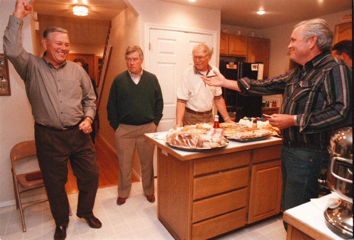 Walt Morrow and Keith Bird celebrate Bird’s victory in a Meridian City Council race. Bird succeeded Morrow on the council.