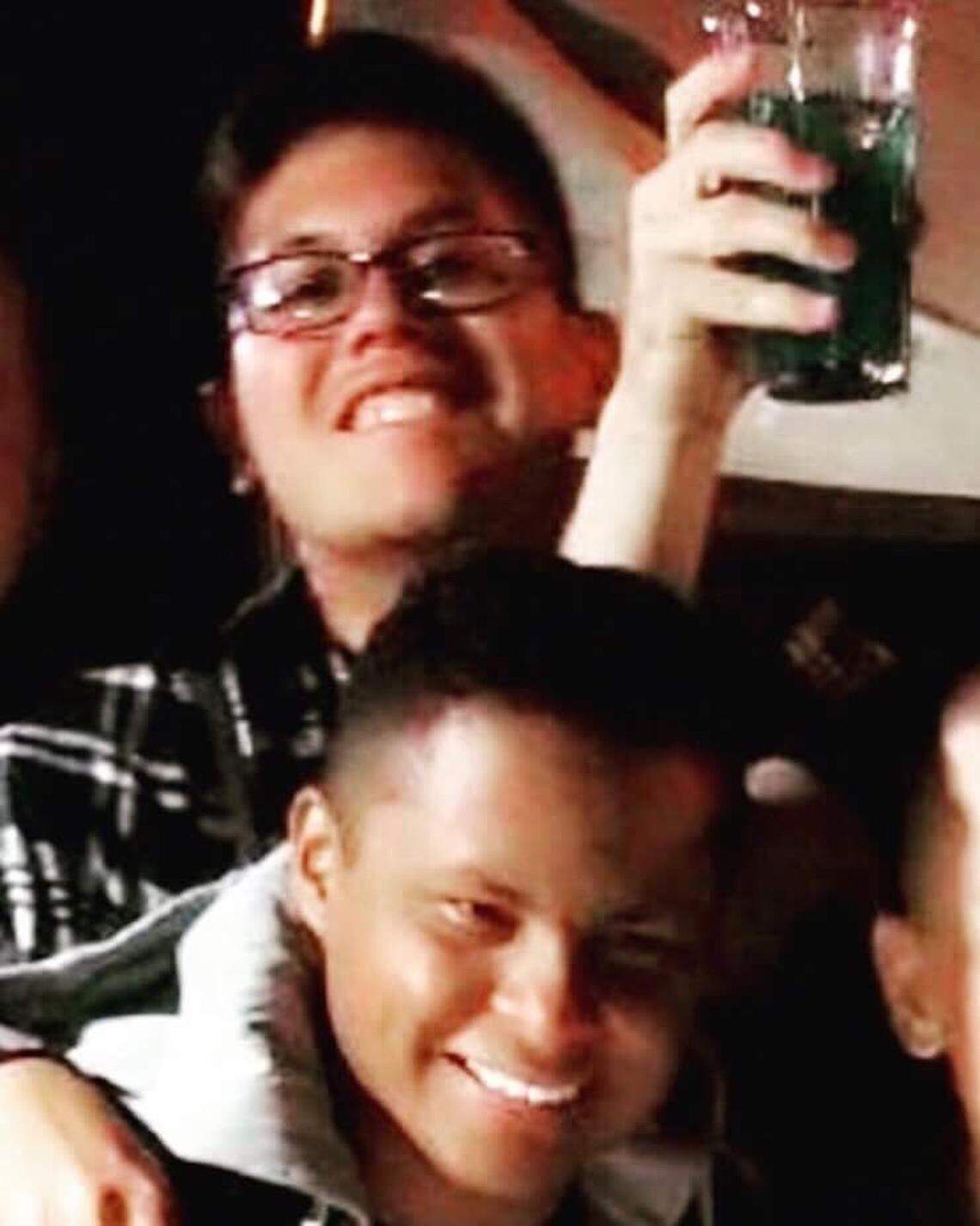 Airmen Lawrence Manlapit III, back, and Carlos Johnson, pictured here at a buddy’s going-away party, became best friends while stationed at Mountain Home Air Force Base.