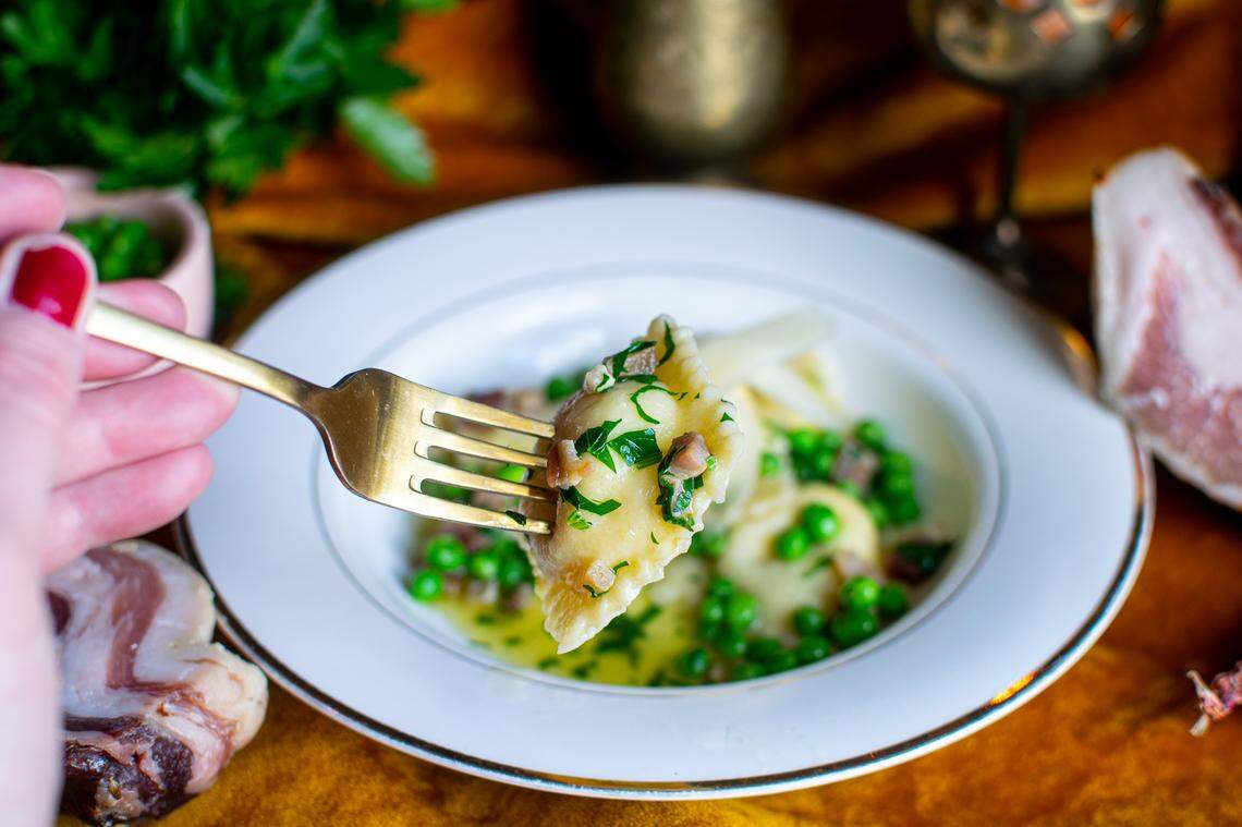 Ravioli with Pancetta (housemade ricotta ravioli, peas and pancetta) is one of the current second-course options.