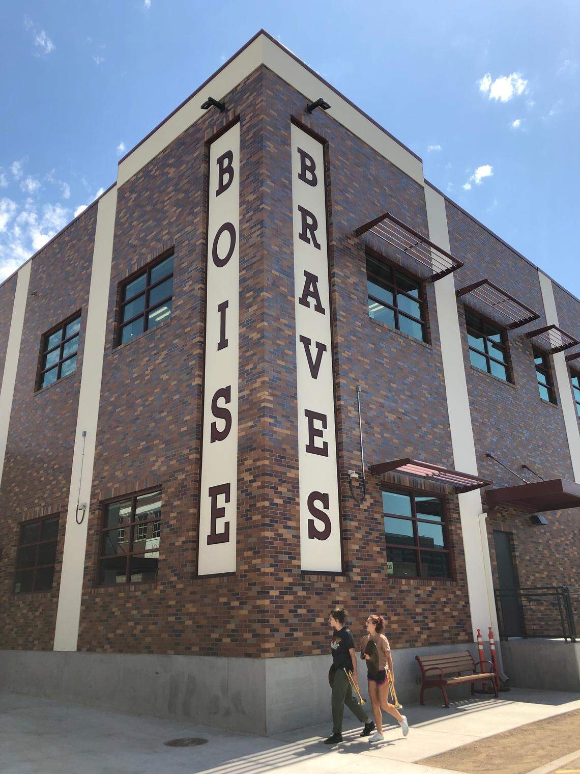 The corner of the new Boise High gym and performing arts center, which opened in May, displays the school’s name and current mascot.