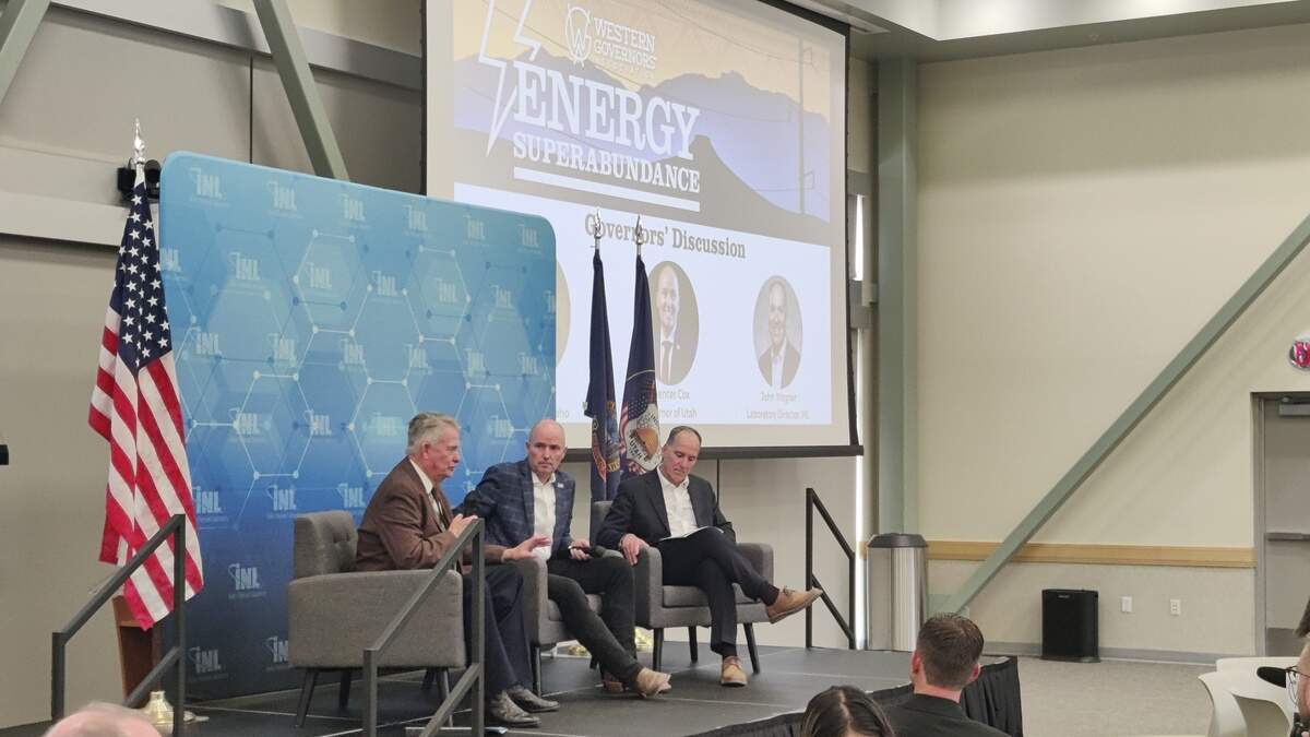 Idaho Gov. Brad Little, left; Utah Gov. Spencer Cox, middle; and Idaho National Laboratory Director John Wagner, right; at a Western Governors Association conference at INL on Sept. 22, 2025.
