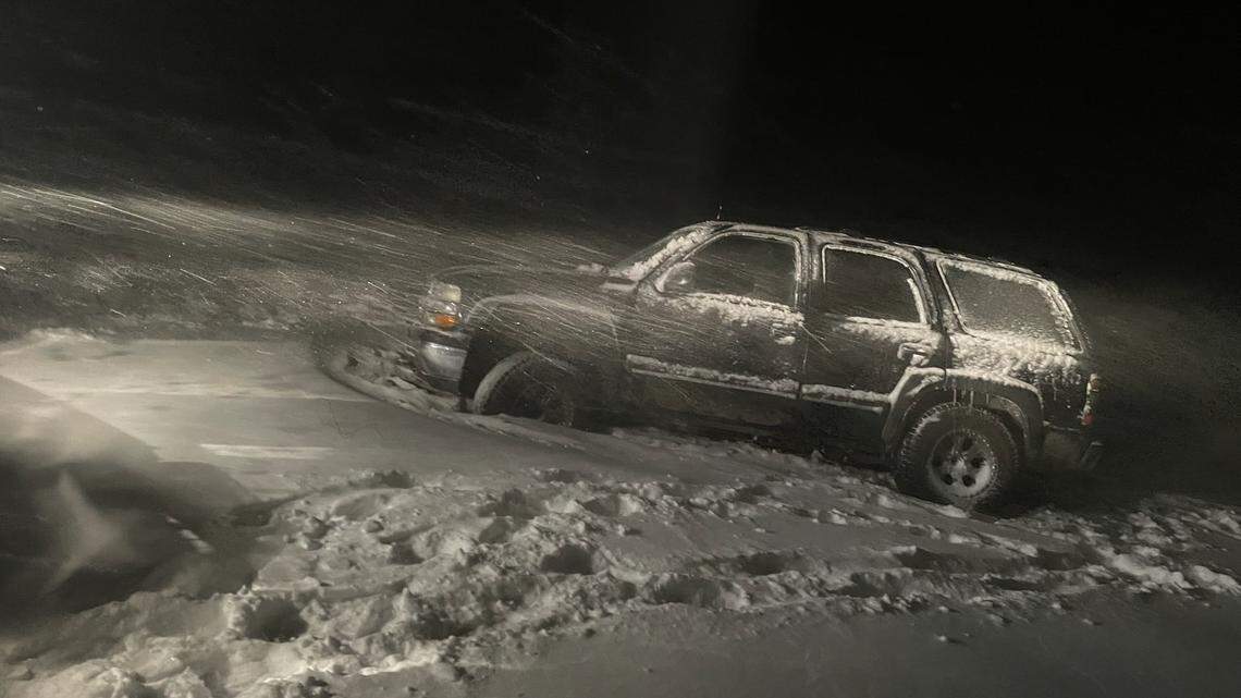 A driver took an SUV up a snowmobile trail and got trapped, rescuers said.