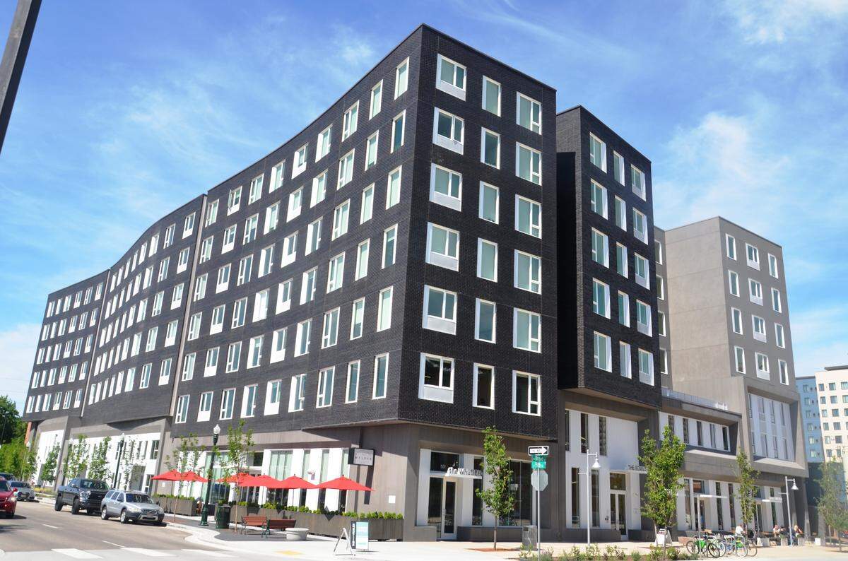 The seven-story Fowler apartments opened at 505 W. Broad St. in March. Construction was substantially completed in late March, nearly nine months after the date specified by the construction contract. Developers of the 159-unit building are suing Andersen Construction of Portland, the builder.