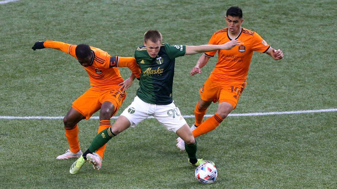 Eagle native Blake Bodily, middle, made his first MLS start on Saturday in the Portland Timbers’ 2-1 win over Houston.