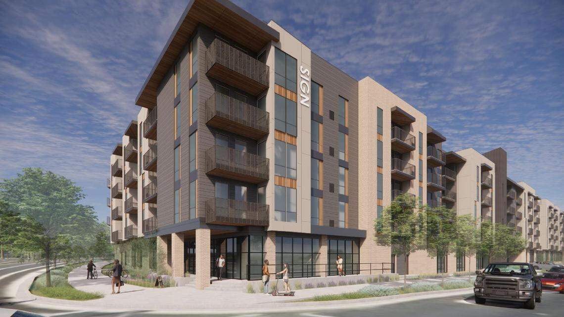 The nearly 200-unit apartment building would include space on the ground floor for businesses. This west-facing rendering shows the building from the intersection of Federal Way and Kootenai Street.