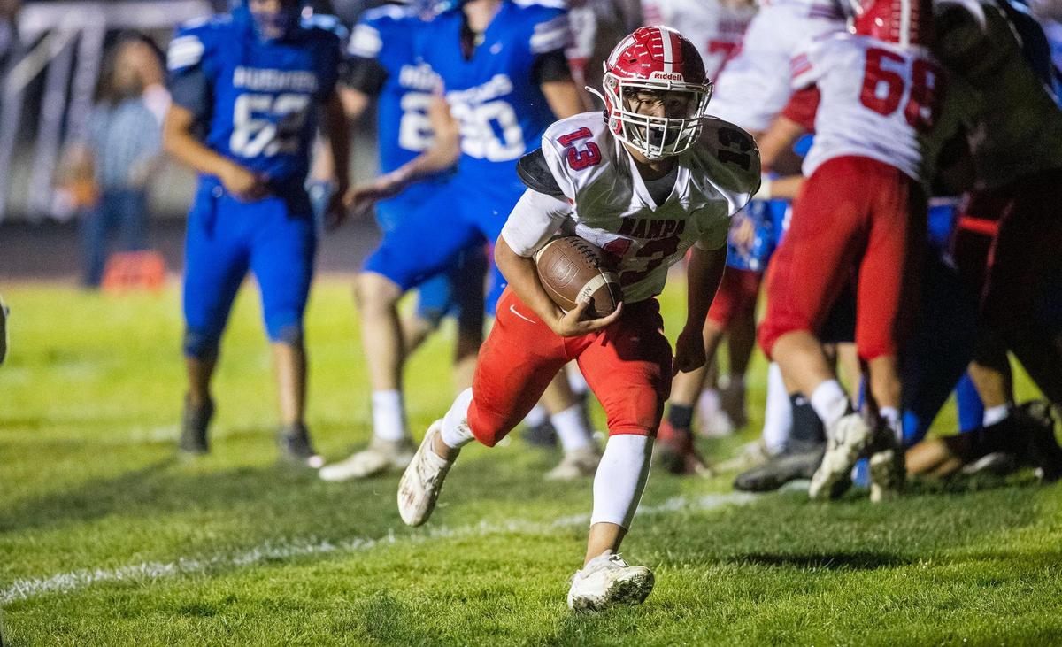Nampa running back Daniel Carrillo runs untouched into the end zone against Emmett in the 4A playoffs last fall.