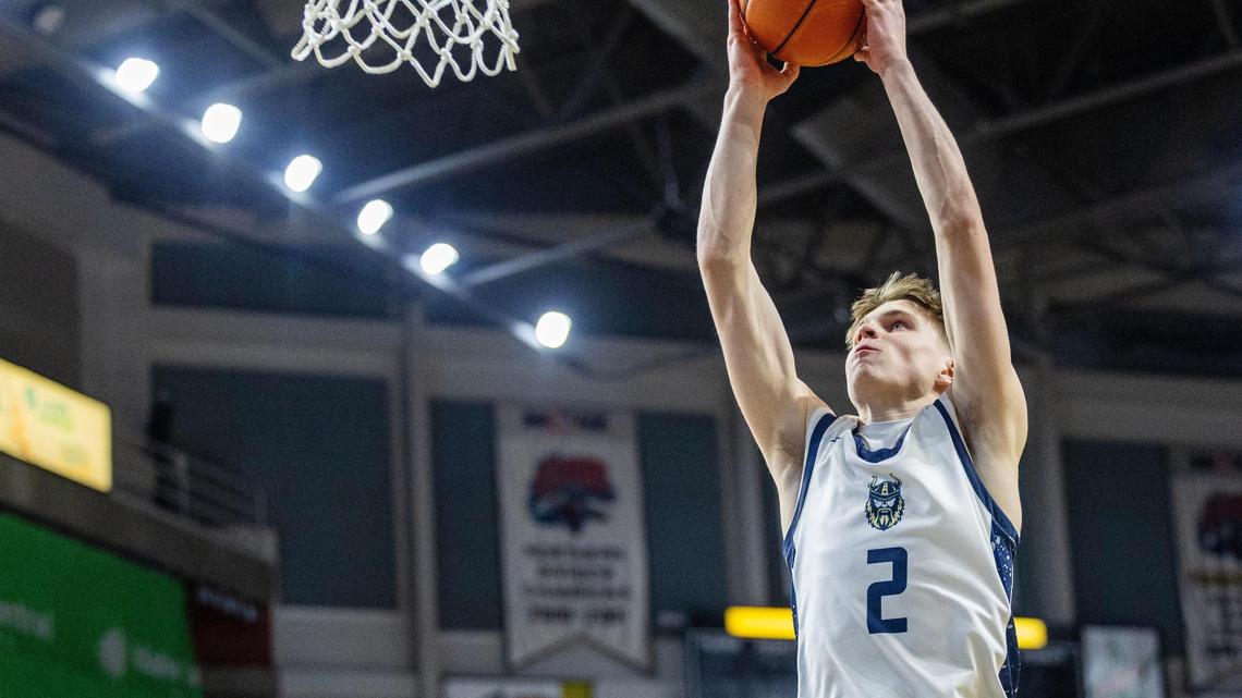 Middleton sophomore Tagg Stucki throws down a dunk in the district championship game last week. He and the Vikings enter as the No. 4 seed in the 5A state tournament this week.