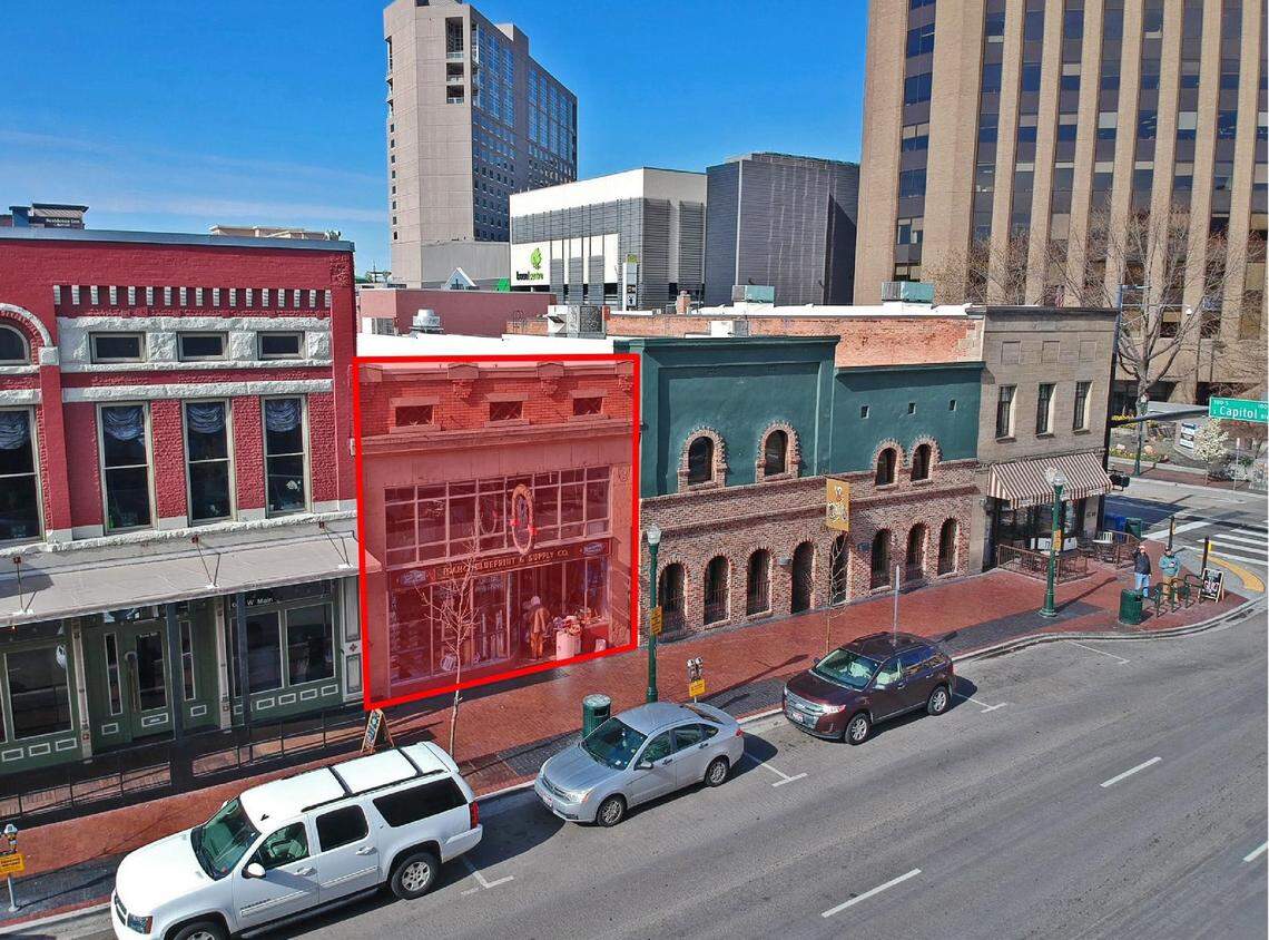 The 1904-built Empire Theater Building at 619 W. Main St., pictured here highlighted in center, is set to become a two-story bar. Coa de Jima restaurant is on the left while Humpin’ Hannah’s is on the right.
