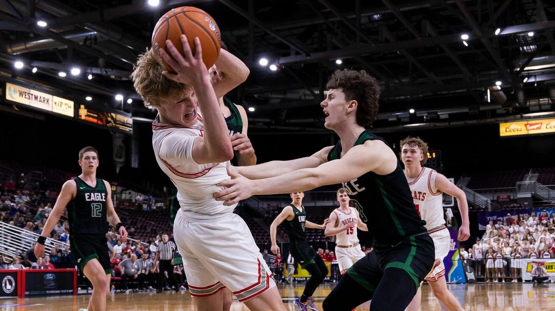 Eagle point guard Russell Gibson, right, led the 5A classification in assists last season (5.8 per game) and returns for his senior season with the Mustangs.