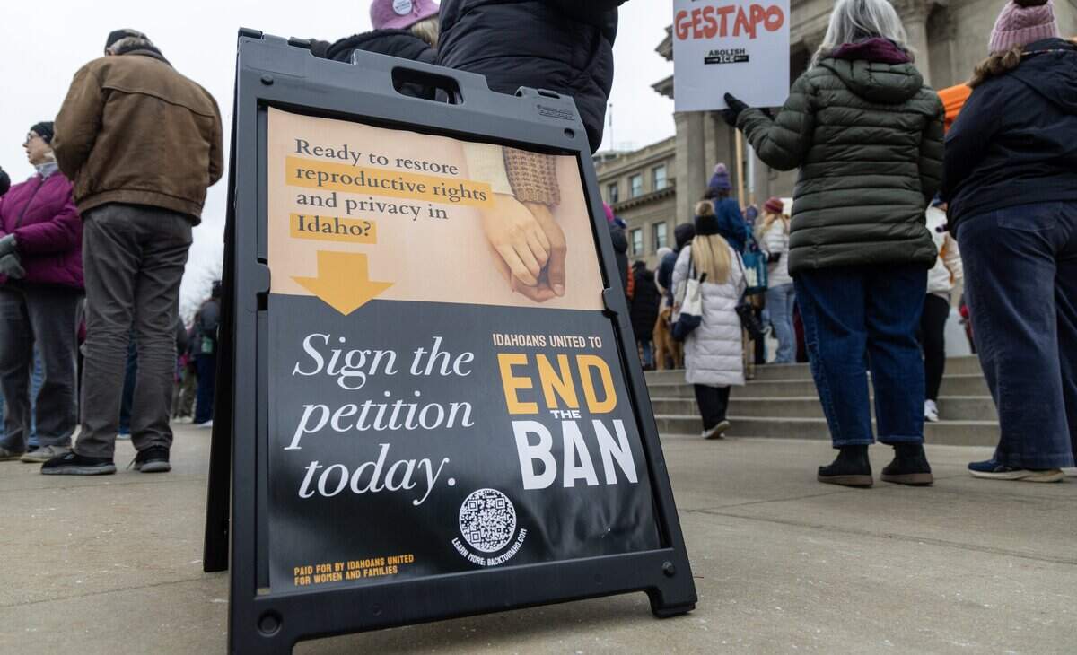 A sign outside the Idaho Capitol gives information on the Reproductive Freedom and Privacy Act, a citizen-led ballot initiative in response to Idaho's ban on abortion.