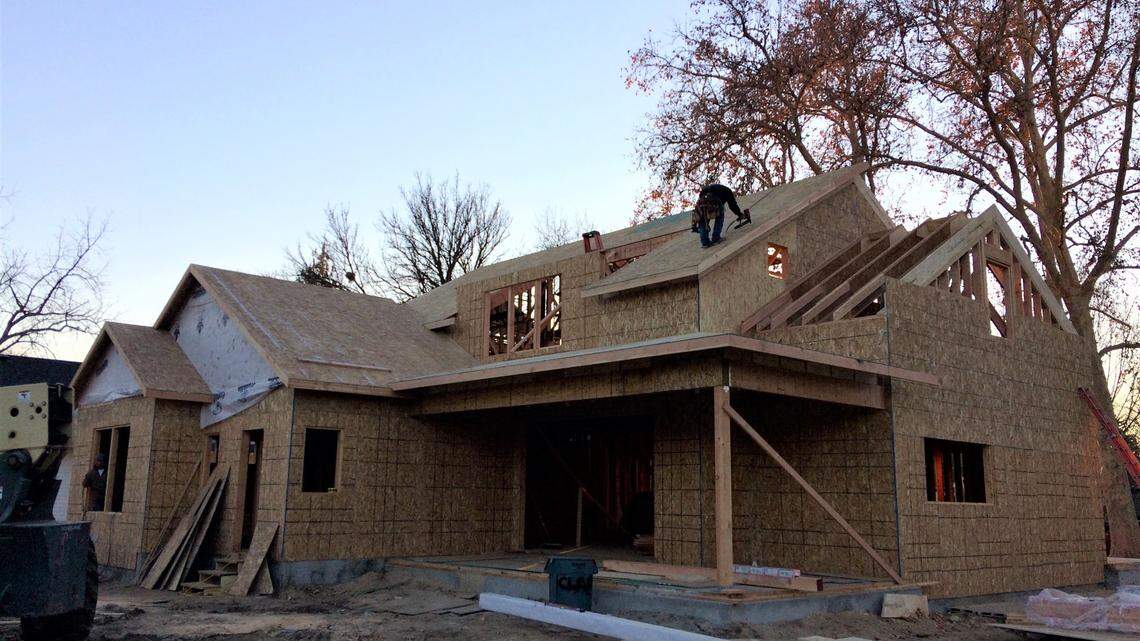 A construction worker works on the roof of a house being built at 20th and Irene streets in Boise’s North End, Dec. 3, 2020.